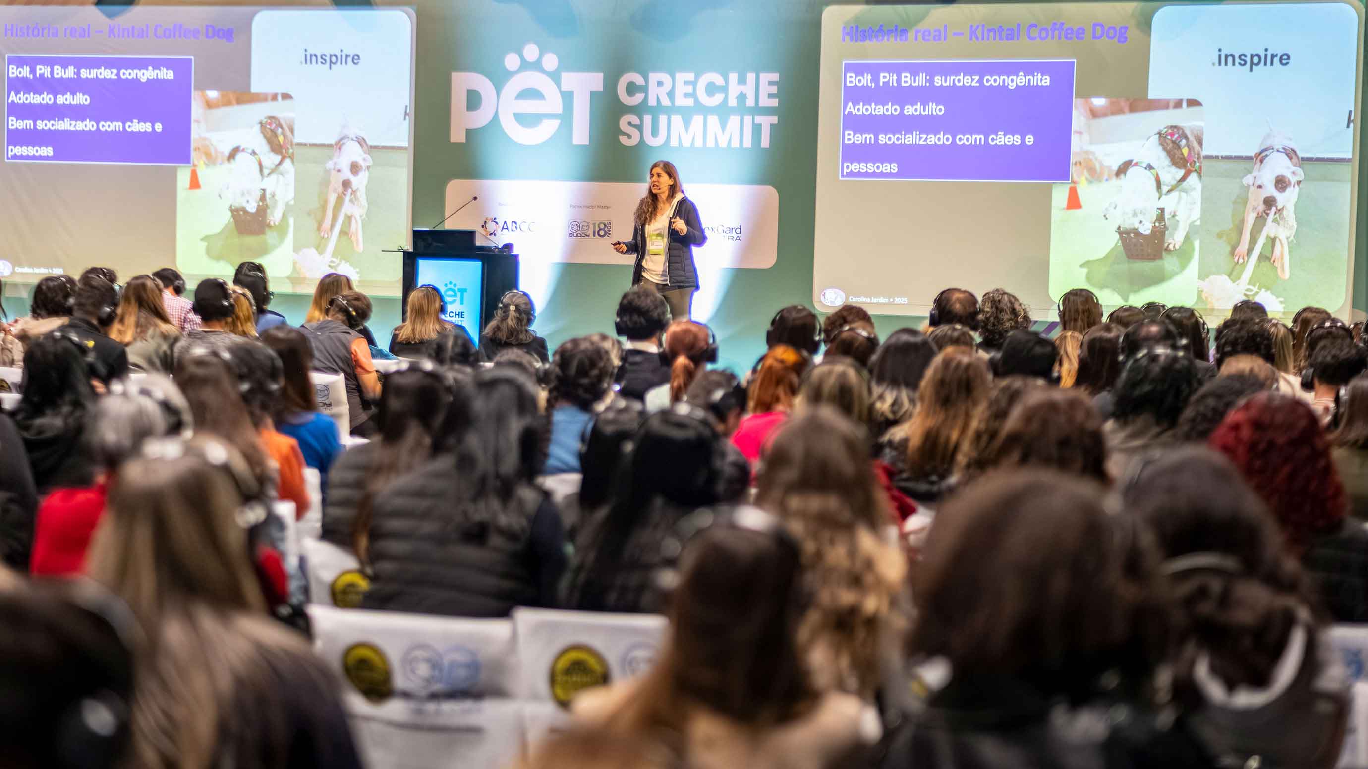 Visitors at a presentation by PET South America